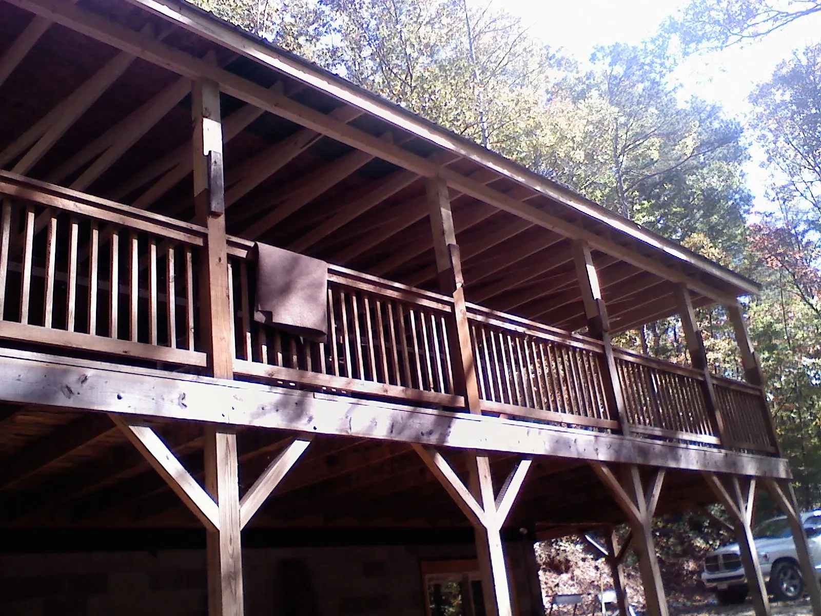 Timber framing under a new elevated porch and deck — Roof Leak Repair in Goshen by Roofing Brothers